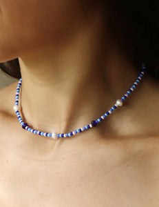 Coastal Inspired handmade necklace with freshwater pearls and blue beads. 