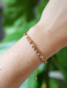 Handmade adjustable macrame stacker bracelet in honey color with Murano glass and rhodium gold beads