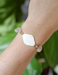 Handmade mother of pearl adjustable bracelet with gemstone beads and golden accents